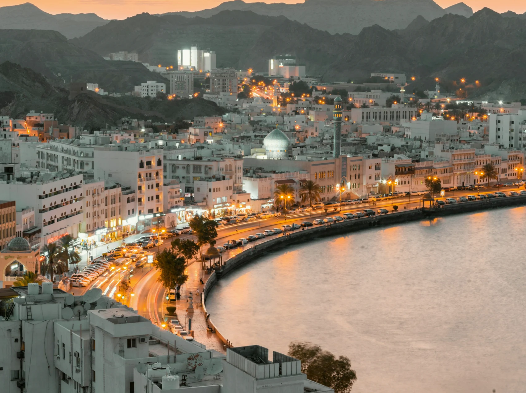 Muttrah Corniche and mountains at sunset